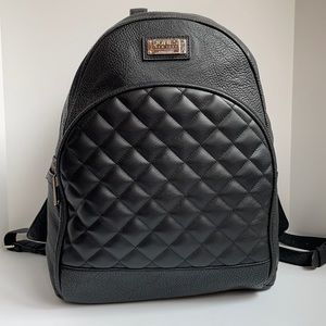 Jones New York quilted two zip pocket wide adjustable strap backpack